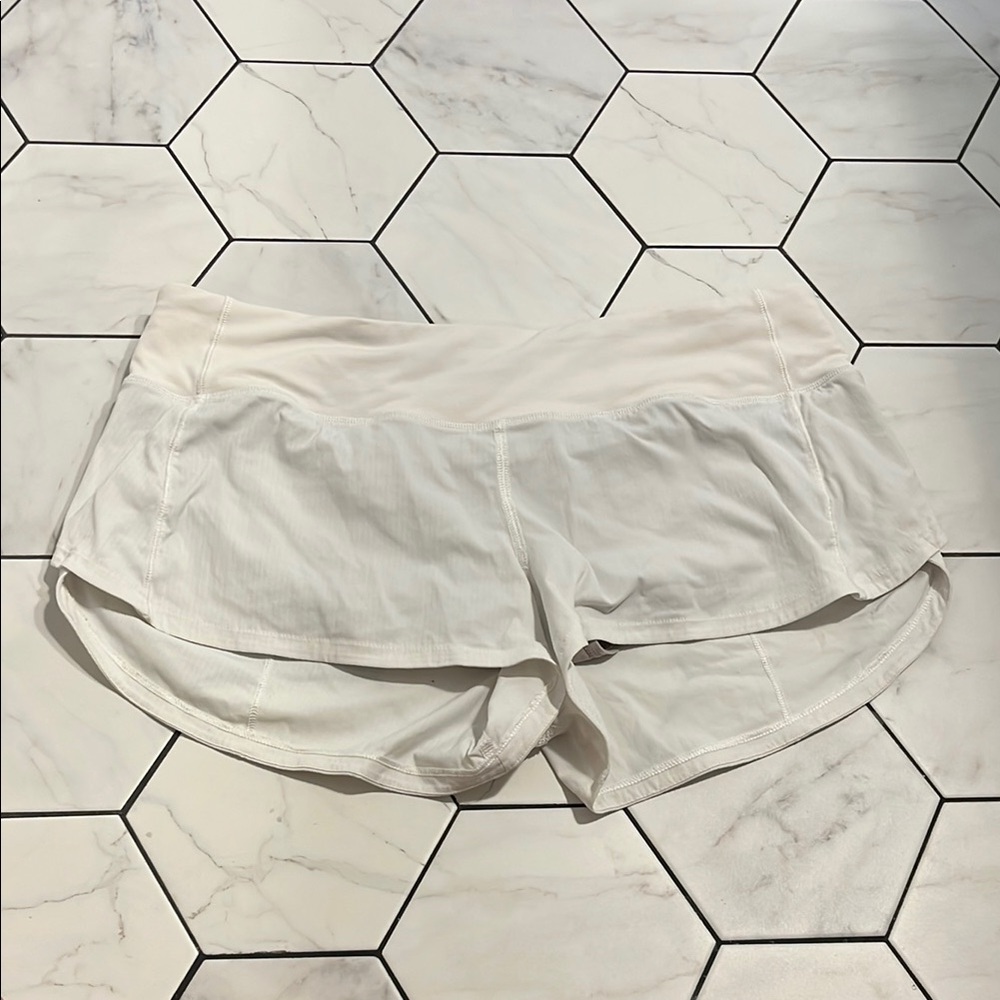white lululemon speed up shorts